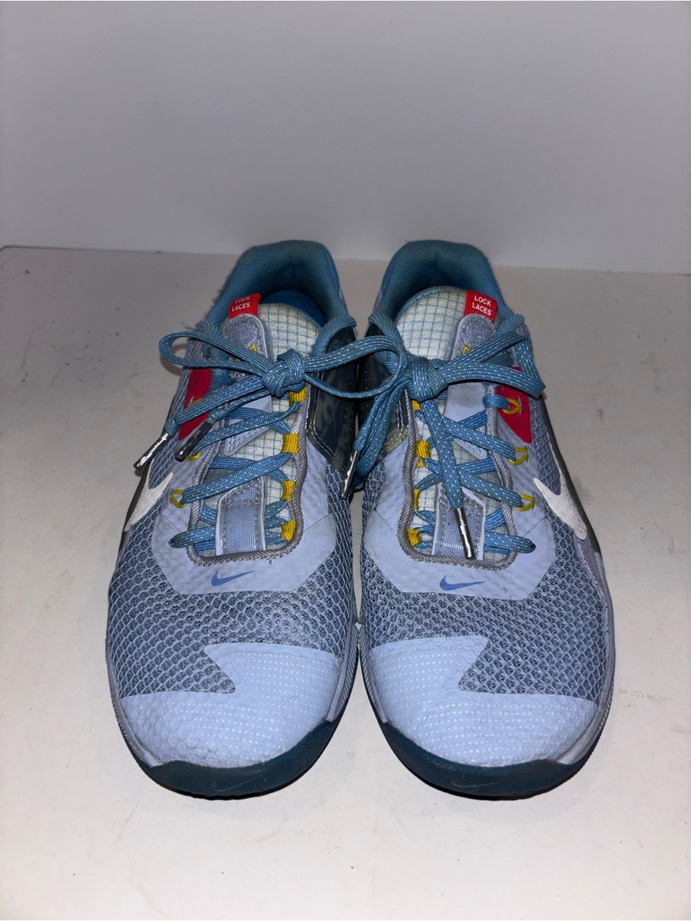 Nike womens Light Blue & Teal Athletic Sneakers with Red Accents